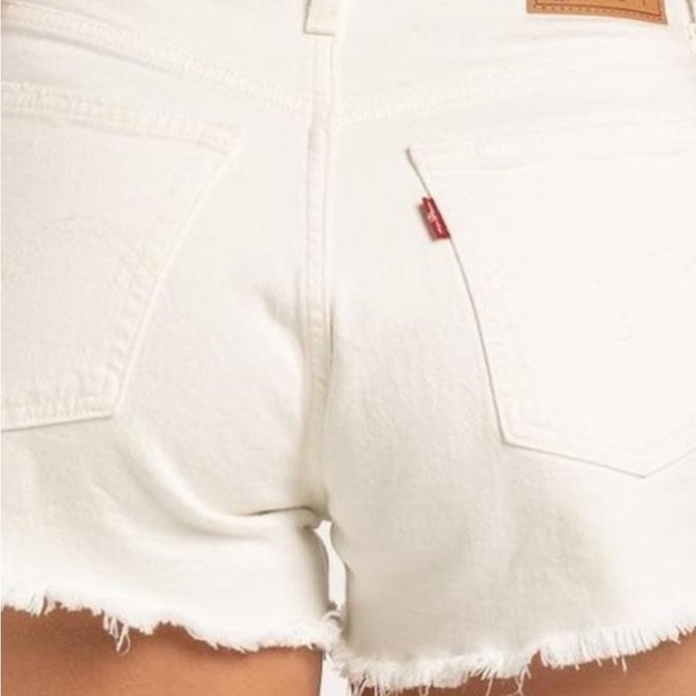Levi's White Denim Cutoff Shorts with Frayed Hem